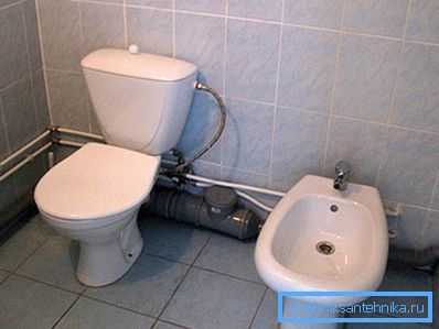 Toilet with mounted bidet Toilet with mounted bidet