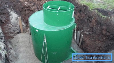 Installation of a plastic well on a cushion of concrete Installation of a plastic well on a cushion of concrete