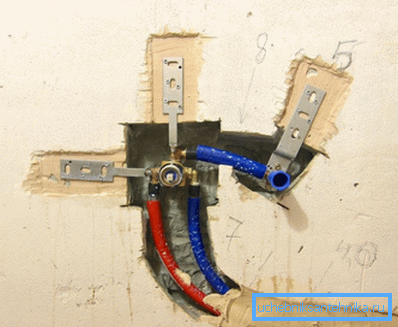 Installed pipe outlets under a conventional mixer