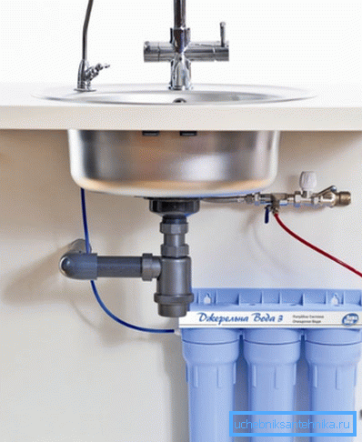 Installed water filter under the sink Installed water filter under the sink