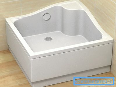 Installed in the corner of the room deep rectangular shower tray