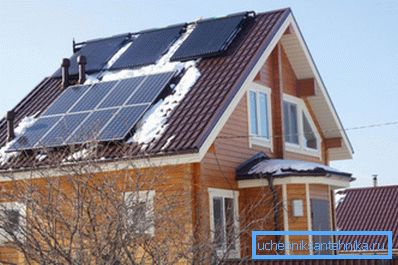 In the upper part of the roof we see three vacuum solar collectors. In the upper part of the roof we see three vacuum solar collectors.