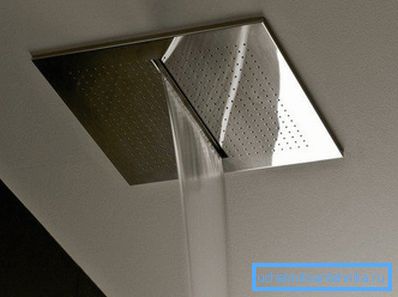 Overhead shower installed in the bathroom ceiling Overhead shower installed in the bathroom ceiling