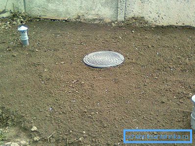 1228 The cesspool is removed from the house and covered with a plastic hatch.
