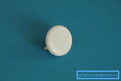 The cap closes the unused inlet in the tank