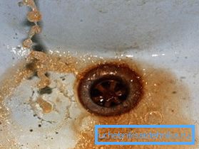 Iron contaminated water, as seen in the photo, is painted in rust color. Iron contaminated water, as seen in the photo, is painted in rust color.