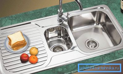 Iron sink with extra capacity and wing
